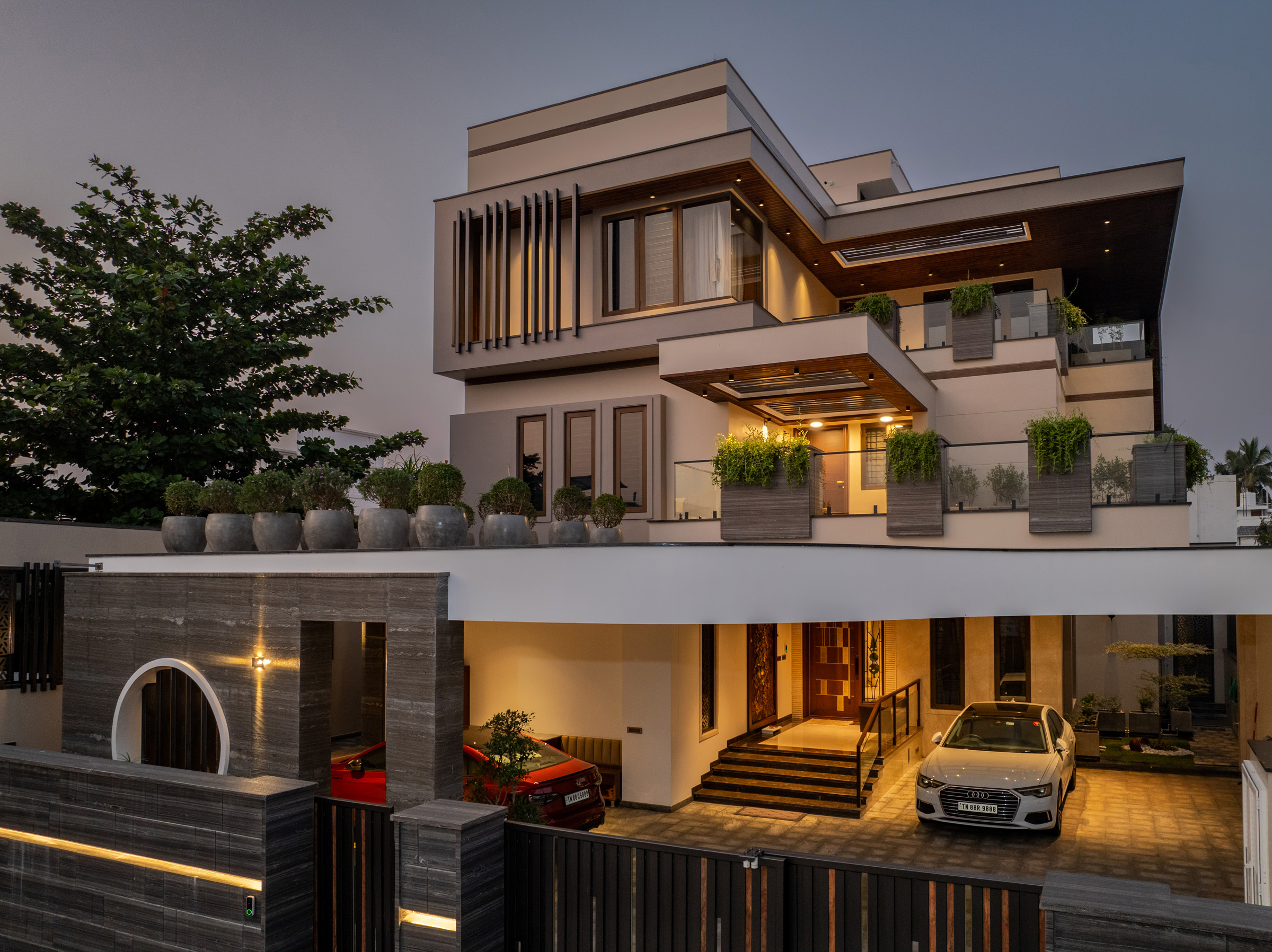 Luxury residential exterior twilight aerial view — Dr. Subramaniam House, Namakkal