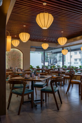 Restaurant entrance and dining area with pendant lights — 4 Cups Restaurant, Coimbatore
