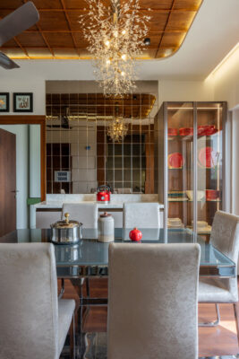 Dining room chandelier interior photography at Sattva Coimbatore