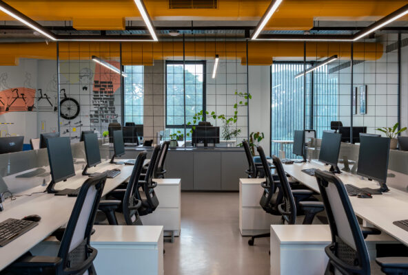 Open office floor with industrial ceiling lighting — Cuboid, Coimbatore