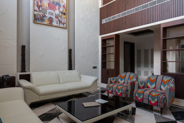 Living room overview with curtains and natural light — Dr. Subramaniam House, Namakkal