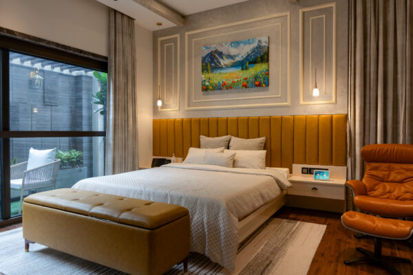Master bedroom with upholstered headboard and ambient lighting — Dr. Subramaniam House, Namakkal