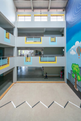 Open walkway with pergola and natural light — Elgi School, Coimbatore