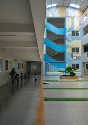 Staircase landing with architectural detail — Elgi School, Coimbatore