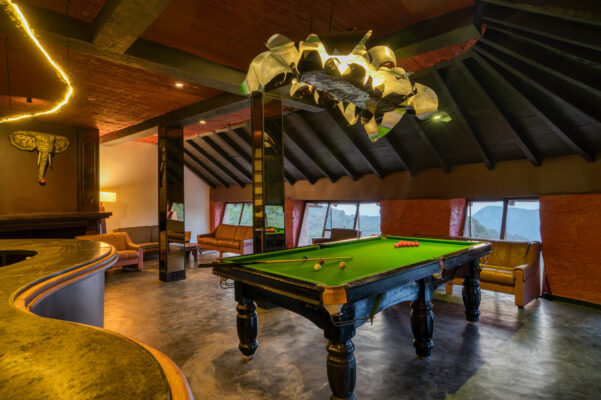 Hotel bar and lounge area with ambient lighting — Mangohills Hotel, Yercaud